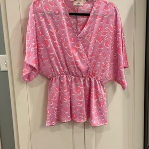 Women’s short sleeve animal print blouse, size medium